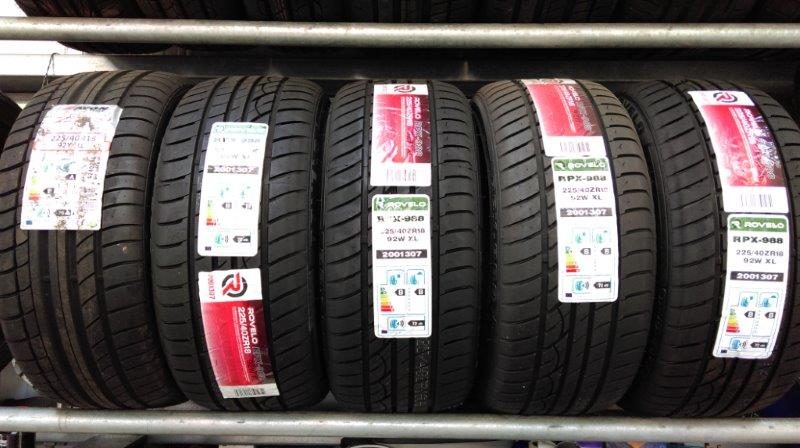 New tyres on the rack with their labels on
